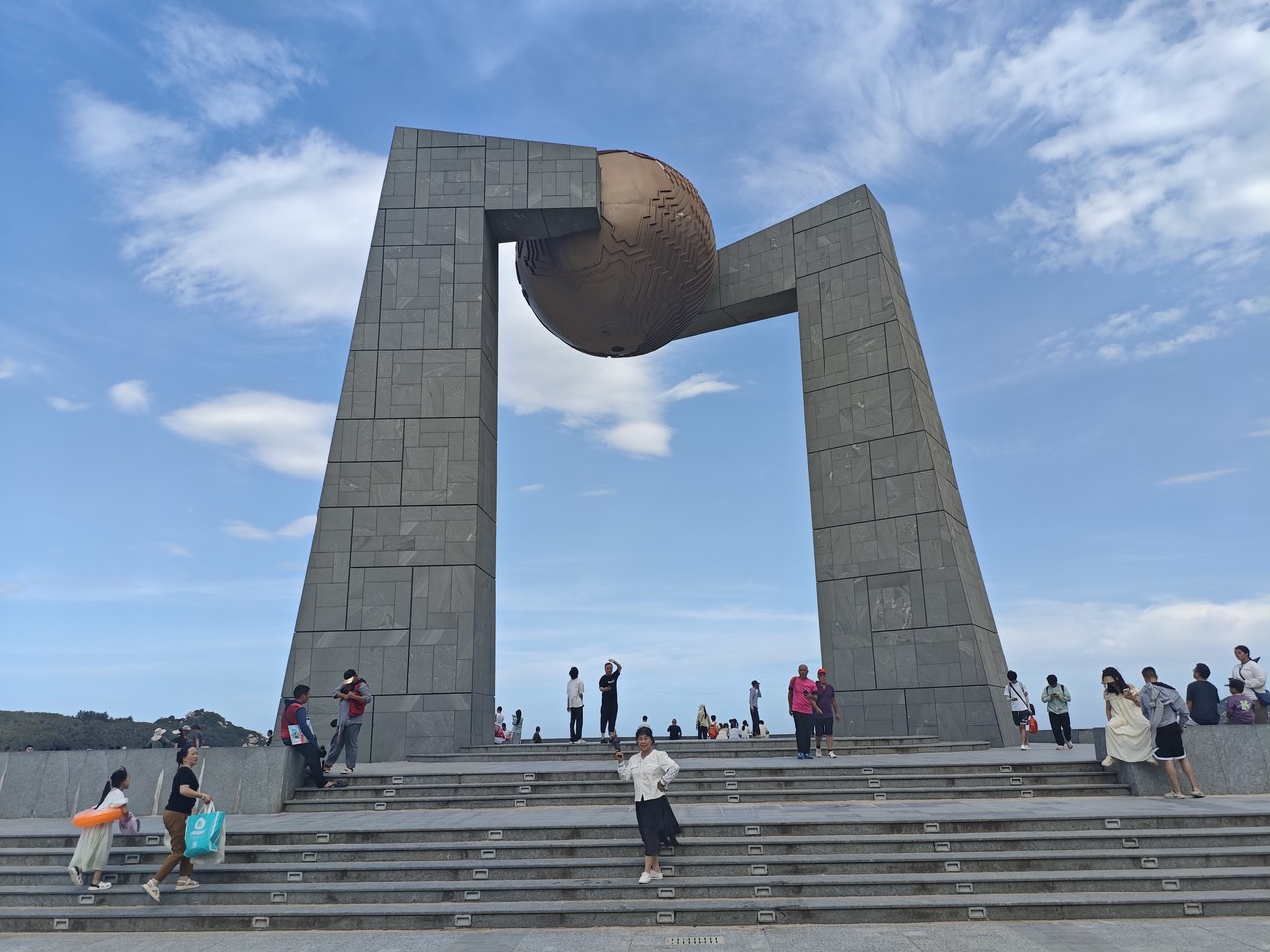 Nature's Gate, the Tropic of Cancer marker, under a blue sky at Qing'ao Bay on Nan'ao Island.