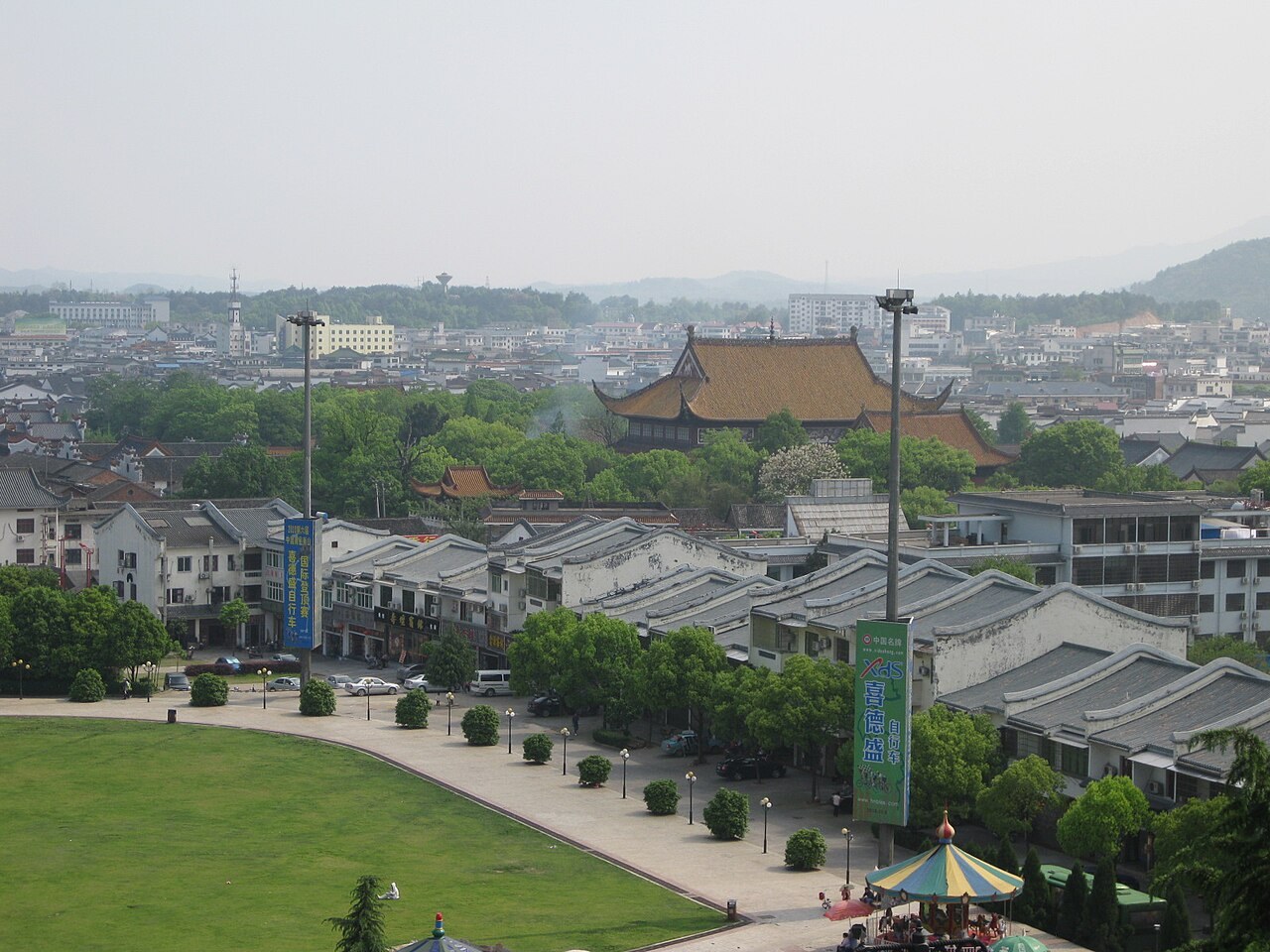 Nanyue Grand Temple’s large tiled roof rises behind the low buildings of Nanyue town.