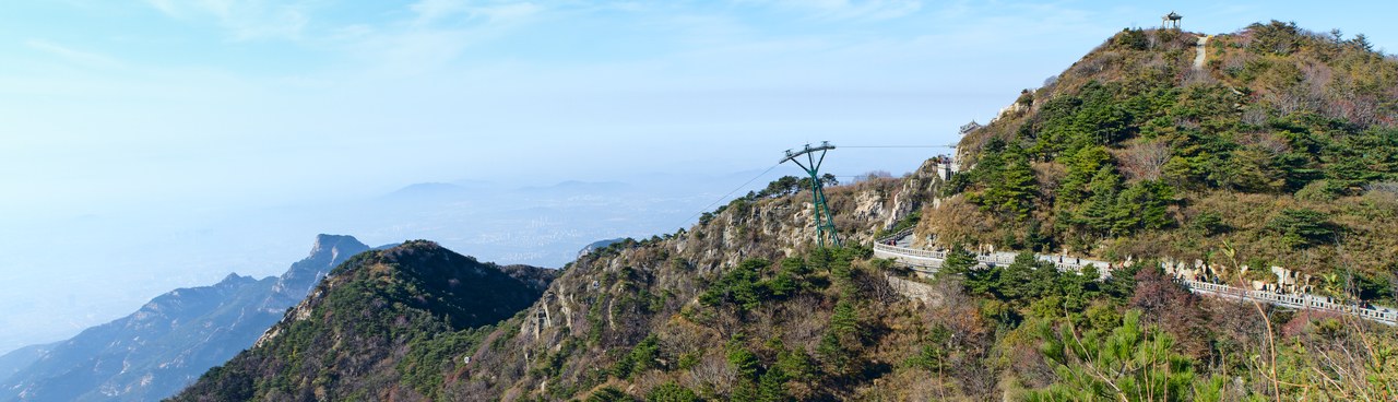 Mount Tai slopes, a cableway and a walking path in a broad mountain panorama