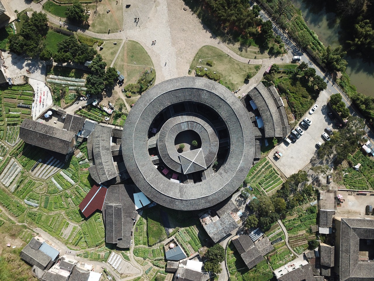 Zhencheng Lou and the surrounding Hongkeng tulou settlement in Yongding, seen from above.