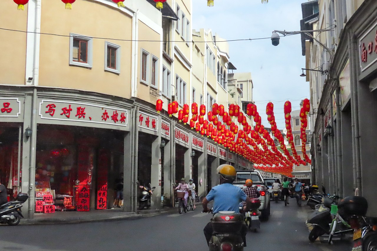 Lanterns and arcaded shopfronts on Youluo Street in Meizhou