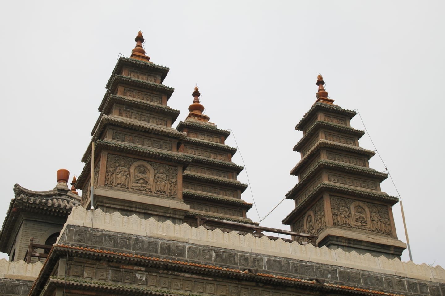 The sculpted stone and brickwork of the Five-Pagoda Temple in Hohhot.